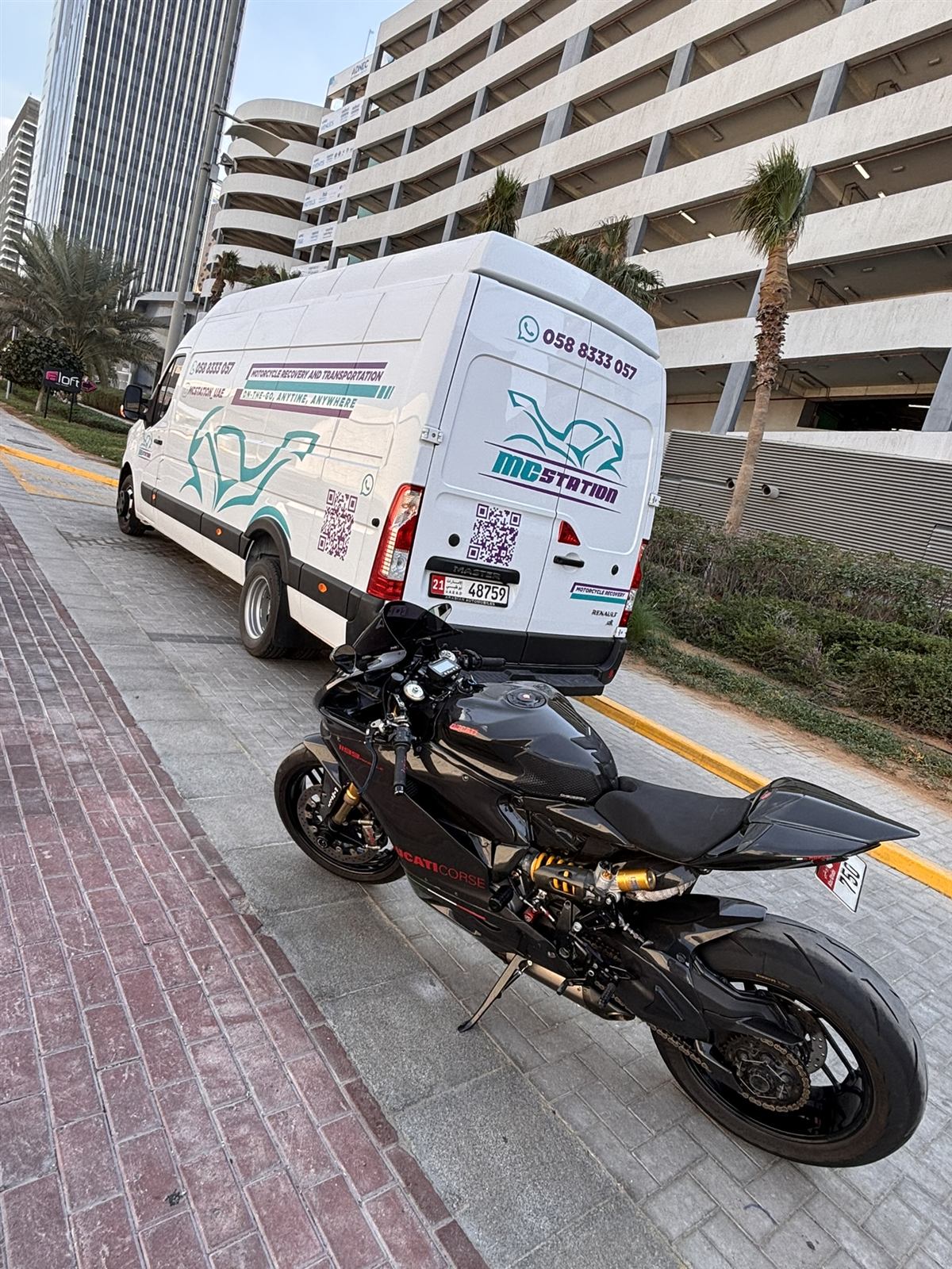 MC Station van with a Ducati superbike ready for transport